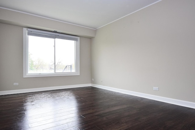 1103 S Hunt Club Dr Unit 127, Mount Prospect, IL 60056 - unfurnished room featuring ornamental molding, dark wood-style flooring, and baseboards