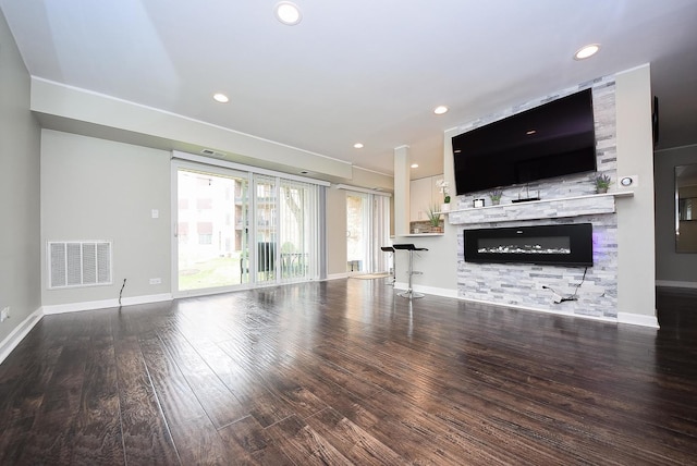 1103 S Hunt Club Dr Unit 127, Mount Prospect, IL 60056 - unfurnished living room featuring wood finished floors, a fireplace, baseboards, and recessed lighting