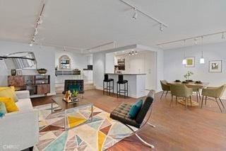 1430 N Astor St Unit 7A, Chicago, IL 60610 - living room with track lighting, wood finished floors, and a dry bar
