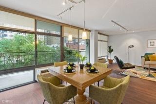 1430 N Astor St Unit 7A, Chicago, IL 60610 - dining space with healthy amount of natural light, a wall of windows, and track lighting
