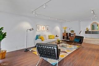 1430 N Astor St Unit 7A, Chicago, IL 60610 - living area featuring track lighting and wood finished floors