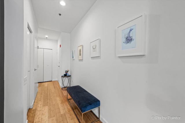 653 N Kingsbury St Unit 706, Chicago, IL 60654 - hallway with light wood finished floors and recessed lighting