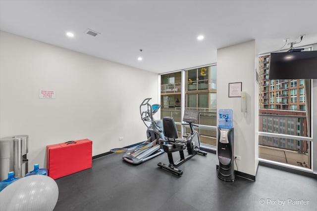 653 N Kingsbury St Unit 706, Chicago, IL 60654 - workout area featuring recessed lighting and baseboards