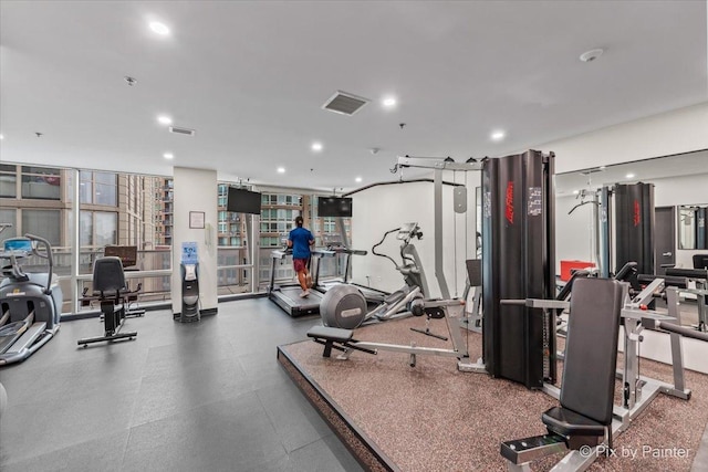 653 N Kingsbury St Unit 706, Chicago, IL 60654 - gym with recessed lighting and a wall of windows