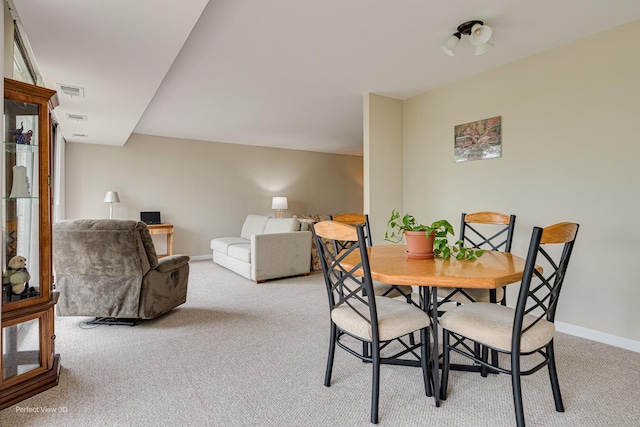 2 S Atrium Way Unit 407, Elmhurst, IL 60126 - dining area featuring carpet floors and baseboards