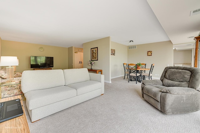 2 S Atrium Way Unit 407, Elmhurst, IL 60126 - carpeted living room with baseboards