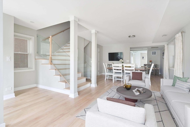 2534 W Haddon Ave, Chicago, IL 60622 - living area featuring stairway, wood finished floors, and baseboards