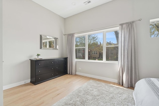 2534 W Haddon Ave, Chicago, IL 60622 - bedroom featuring light wood-style flooring and baseboards
