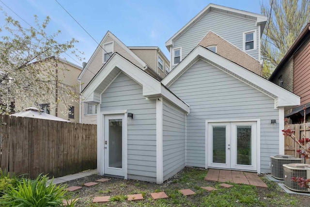 2534 W Haddon Ave, Chicago, IL 60622 - back of property with french doors, fence, and central air condition unit