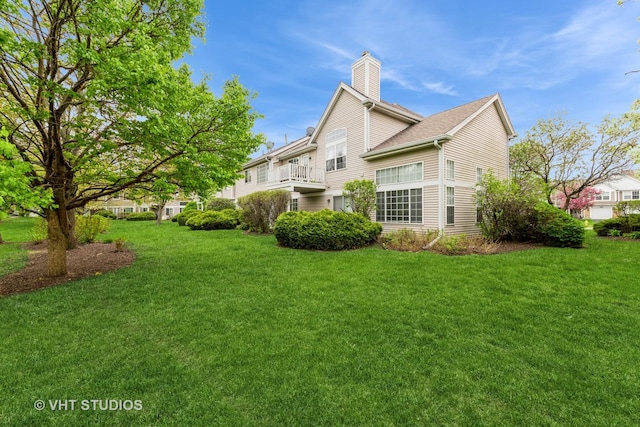 169 Concord Ln, Carol Stream, IL 60188 - view of side of property with a chimney and a lawn