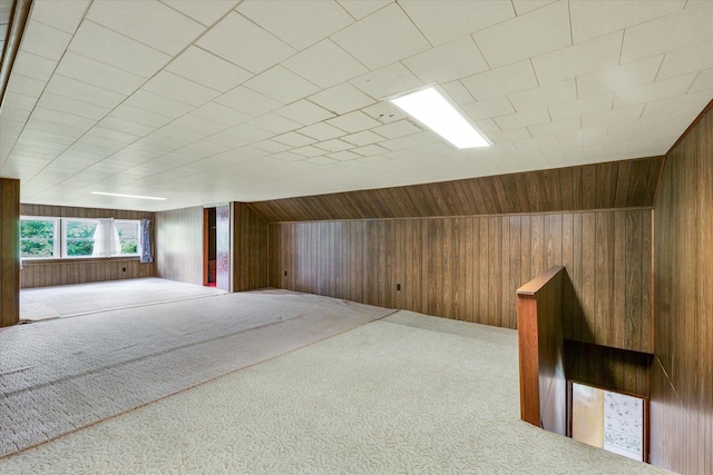 235 N Main St, Roberts, IL 60962 - bonus room featuring carpet flooring, wooden walls, and lofted ceiling