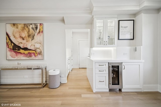 4300 N Marine Dr Unit 306, Chicago, IL 60613 - indoor dry bar with beverage cooler, light wood finished floors, and baseboards