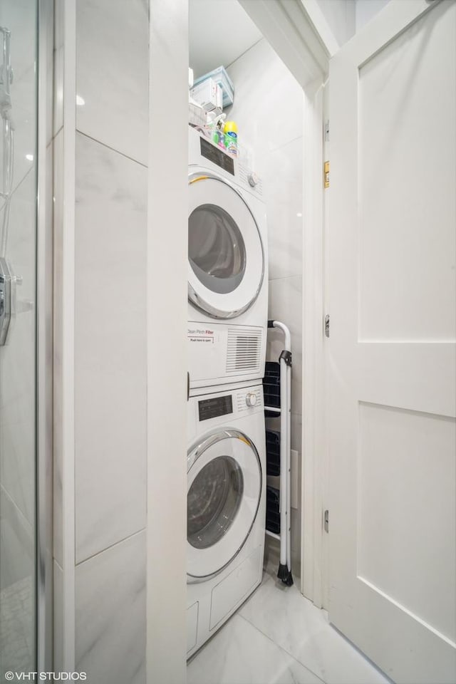 4300 N Marine Dr Unit 306, Chicago, IL 60613 - washroom featuring stacked washing machine and dryer