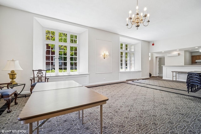 4300 N Marine Dr Unit 306, Chicago, IL 60613 - carpeted living area featuring an AC wall unit, a chandelier, and baseboards