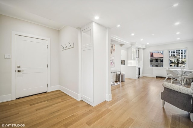 4300 N Marine Dr Unit 306, Chicago, IL 60613 - entryway with light wood finished floors, recessed lighting, baseboards, and ornamental molding