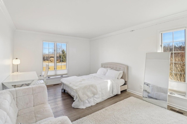 723 Beacon Dr, Lake Barrington, IL 60010 - bedroom featuring crown molding, wood finished floors, and baseboards