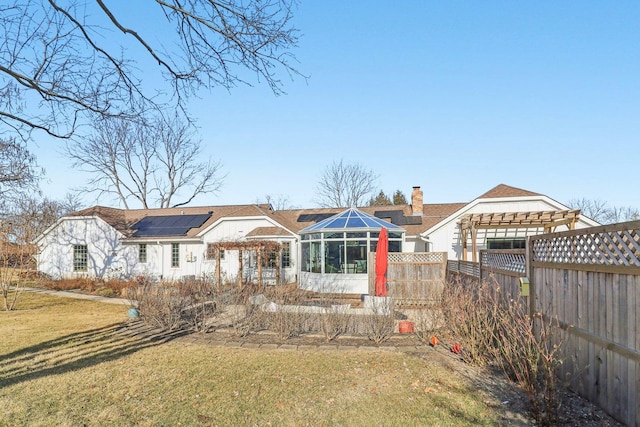 723 Beacon Dr, Lake Barrington, IL 60010 - view of front of home featuring solar panels and a sunroom