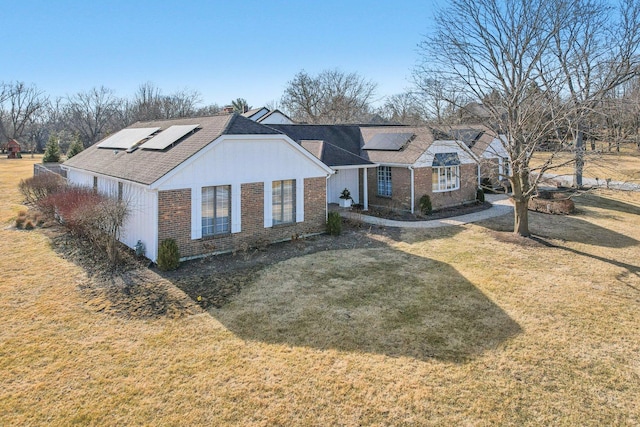 723 Beacon Dr, Lake Barrington, IL 60010 - ranch-style house with brick siding, solar panels, and a front lawn
