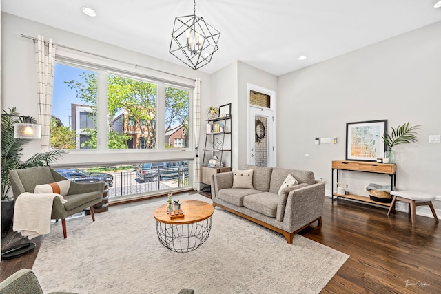 2629 W Homer St, Chicago, IL 60647 - living area featuring dark wood finished floors, a chandelier, and recessed lighting