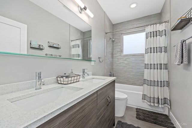 2629 W Homer St, Chicago, IL 60647 - full bathroom with double vanity, shower / bathtub combination with curtain, toilet, recessed lighting, and wood finished floors
