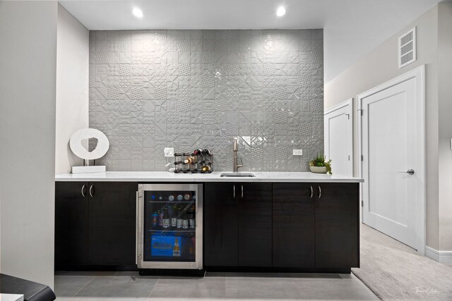 2629 W Homer St, Chicago, IL 60647 - indoor bar with wine cooler, recessed lighting, and tasteful backsplash