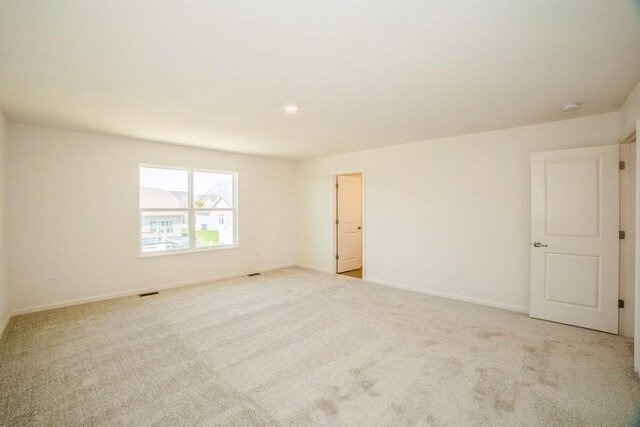 540 N Sycamore St, Hinckley, IL 60520 - spare room featuring carpet floors and baseboards