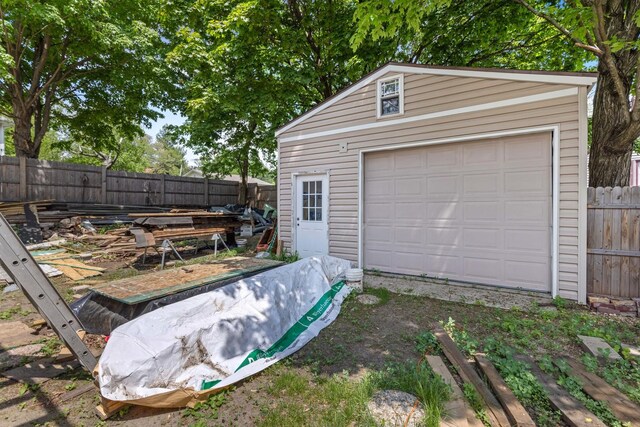 743 Davis St, Rockford, IL 61107 - detached garage featuring fence