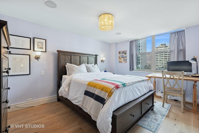 40 E Cedar St Unit 8Cd, Chicago, IL 60611 - bedroom featuring light wood-type flooring