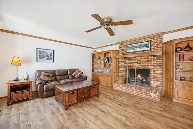 5808 Amherst Ct, Mchenry, IL 60050 - living area featuring ornamental molding, ceiling fan, a brick fireplace, and wood finished floors