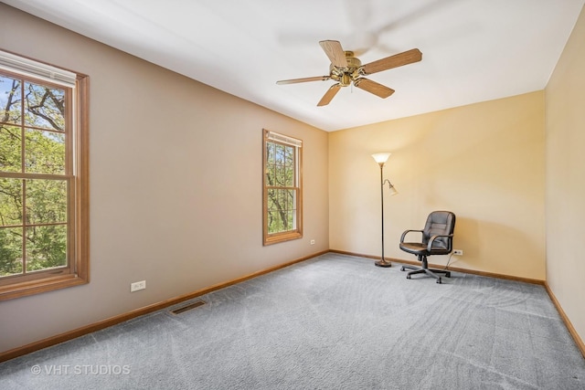 5808 Amherst Ct, Mchenry, IL 60050 - unfurnished room with carpet floors, baseboards, and a ceiling fan