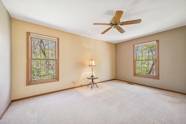 5808 Amherst Ct, Mchenry, IL 60050 - spare room featuring plenty of natural light, carpet flooring, baseboards, and ceiling fan