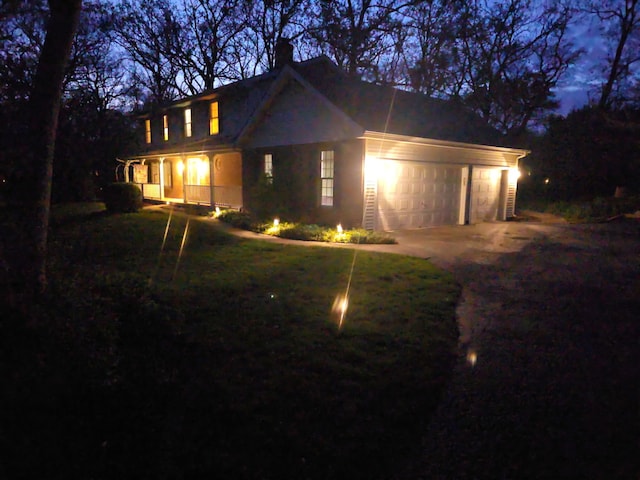 5808 Amherst Ct, Mchenry, IL 60050 - traditional home featuring a chimney, a garage, and concrete driveway