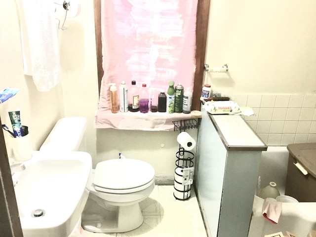14336 S Harrison Ave, Posen, IL 60469 - bathroom with toilet, tile patterned flooring, and a sink