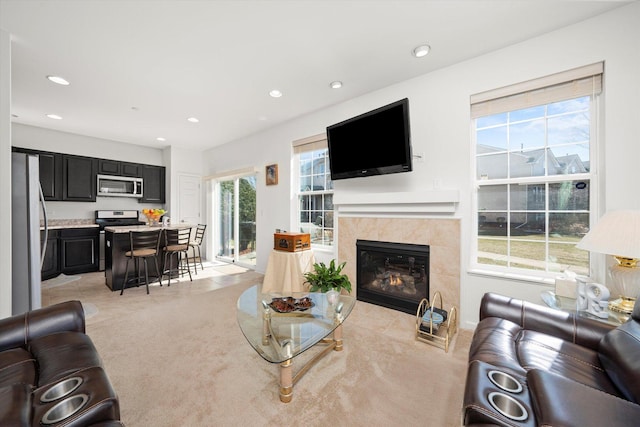 217 Owen St, Matteson, IL 60443 - living room with recessed lighting, a fireplace, and light carpet