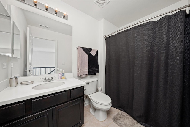 217 Owen St, Matteson, IL 60443 - full bathroom featuring tile patterned floors, toilet, and vanity