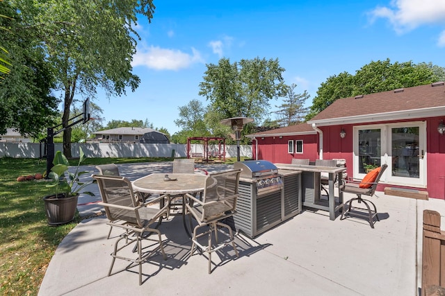 view of patio with fence, outdoor dining area, and a pergola