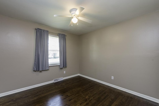 916 Wilson Ct, Zion, IL 60099 - unfurnished room with ceiling fan and dark wood-style flooring