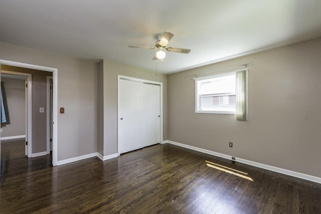 916 Wilson Ct, Zion, IL 60099 - unfurnished bedroom featuring a closet, wood finished floors, and ceiling fan