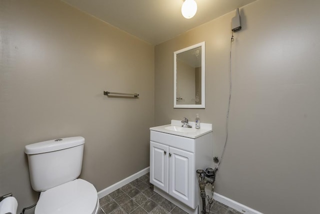 916 Wilson Ct, Zion, IL 60099 - half bathroom featuring toilet and vanity