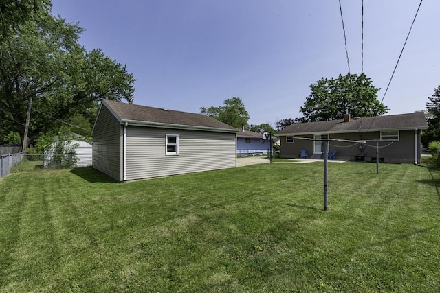 916 Wilson Ct, Zion, IL 60099 - view of yard featuring an outdoor structure