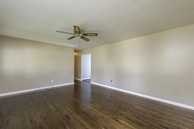 916 Wilson Ct, Zion, IL 60099 - spare room with ceiling fan and dark wood-style floors