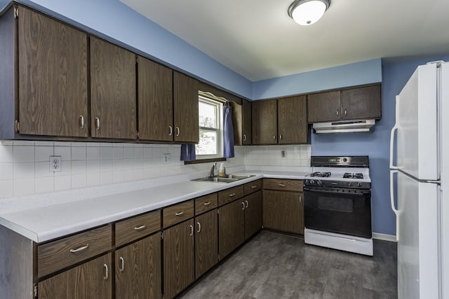916 Wilson Ct, Zion, IL 60099 - kitchen featuring white appliances, dark brown cabinets, under cabinet range hood, backsplash, and light countertops