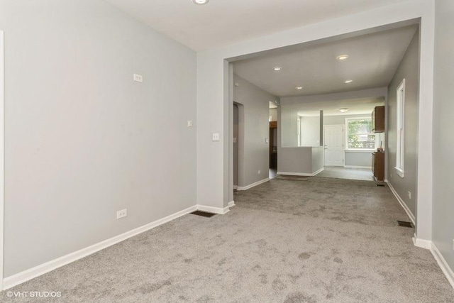 1505 E 76th Pl, Chicago, IL 60619 - spare room featuring carpet floors and recessed lighting