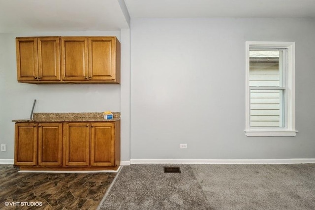1505 E 76th Pl, Chicago, IL 60619 - bar area featuring baseboards and dark colored carpet