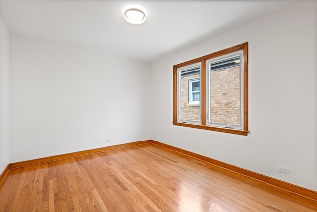 2934 Maple Ave, Berwyn, IL 60402 - unfurnished room featuring light wood-style flooring and baseboards