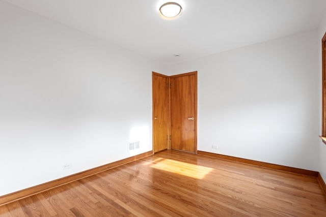 2934 Maple Ave, Berwyn, IL 60402 - spare room with wood finished floors and baseboards
