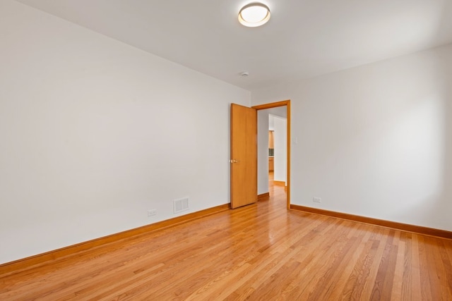 2934 Maple Ave, Berwyn, IL 60402 - spare room with light wood-type flooring and baseboards