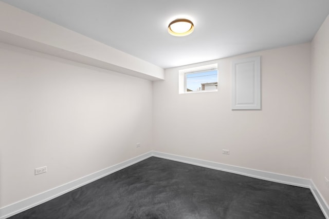 2934 Maple Ave, Berwyn, IL 60402 - below grade area featuring baseboards and dark colored carpet