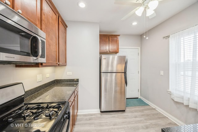 50 Forest Ave Unit 3S, Riverside, IL 60546 - kitchen featuring stainless steel appliances, a ceiling fan, recessed lighting, brown cabinets, and baseboards