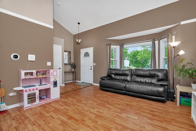 3513 Harris Dr, Joliet, IL 60431 - living room with light wood-style flooring, high vaulted ceiling, and baseboards